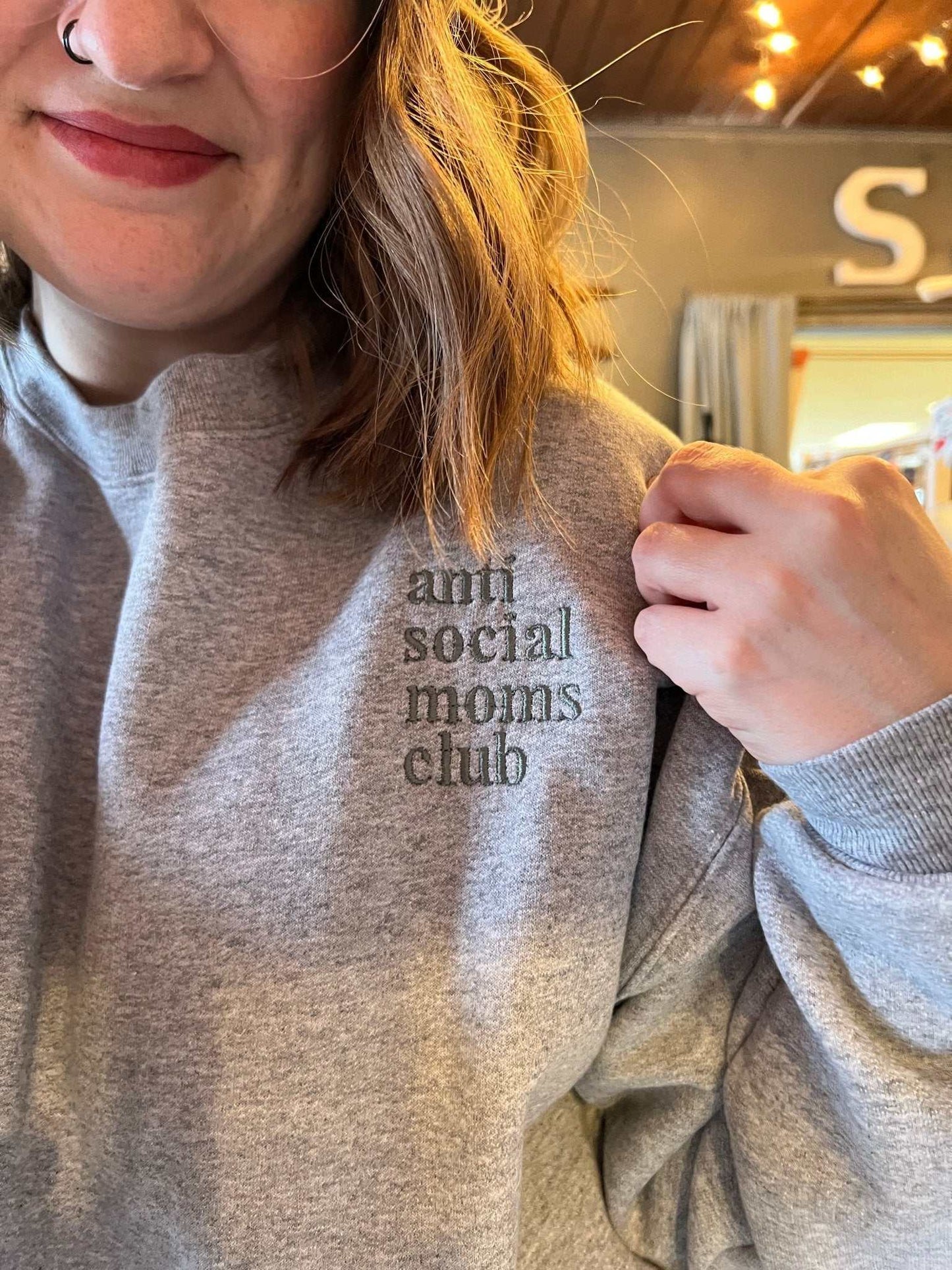 Anti Social Moms Club embroidered crewneck sweatshirt in gray.